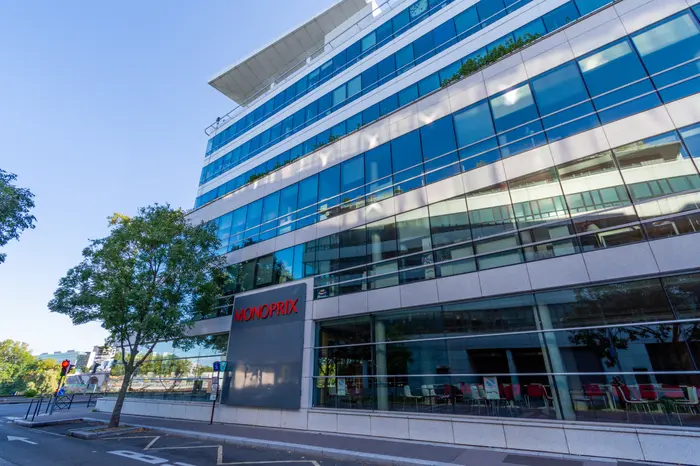 Clichy, France -  Façade de l'immeuble abritant le siège social de Monoprix.